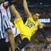 Michigan junior Jordan Morgan hangs from the rim during the second half of the national championship game at the Georgia Dome in Atlanta on Monday, April 8, 2013. Melanie Maxwell I AnnArbor.com